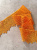 Кружево оранжевое, ширина 6,5 см Италия КИО/65/2957 по цене 425 руб./метр