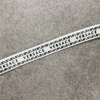 Тесьма белая черная надпись, 1 см ТКБ/10/7943 vers по цене 130 руб./метр